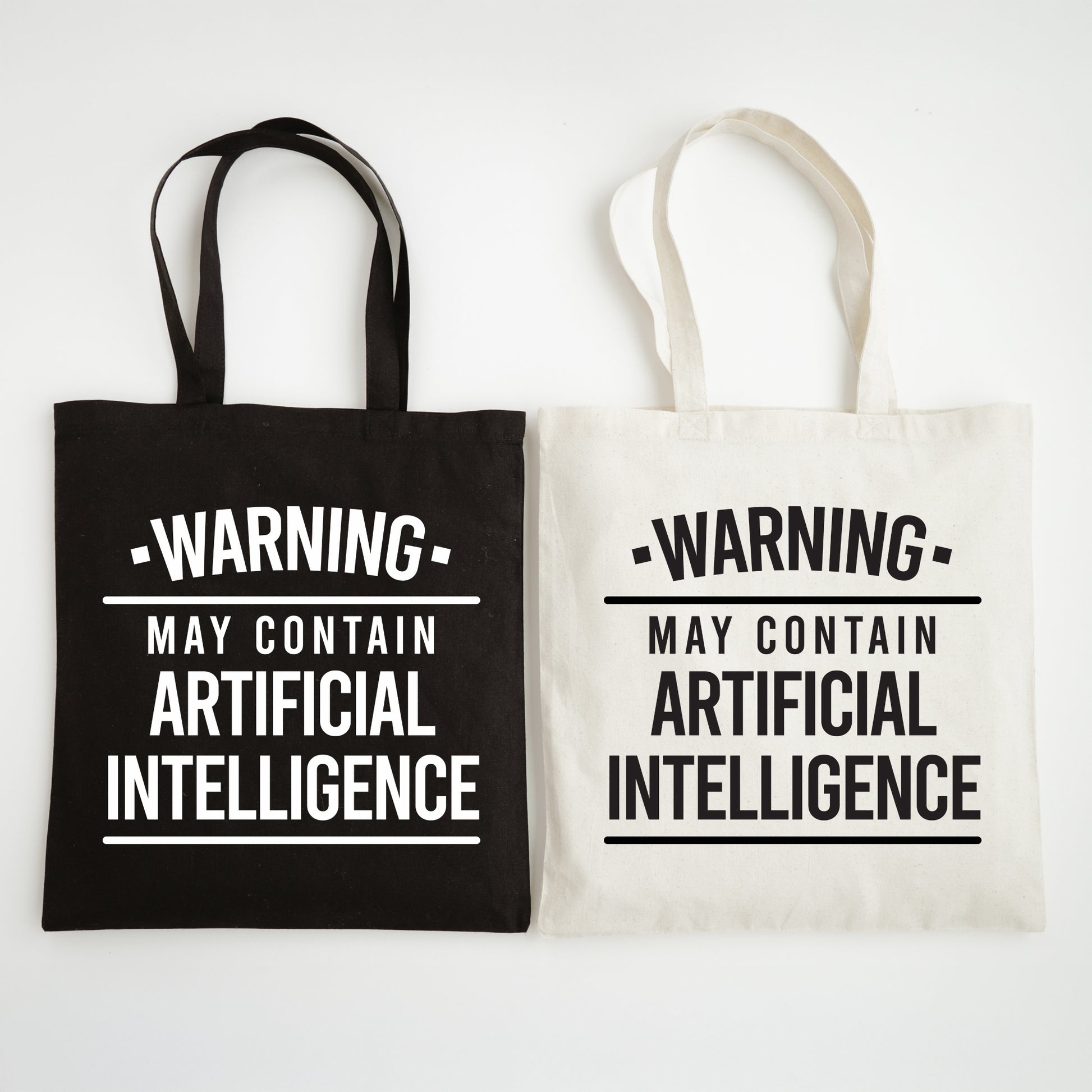 Two tote bags with 'Warning: May Contain Artificial Intelligence' text on a white background