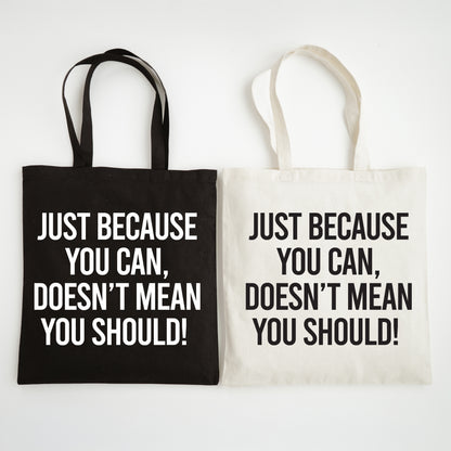 Two tote bags with motivational text on a white background