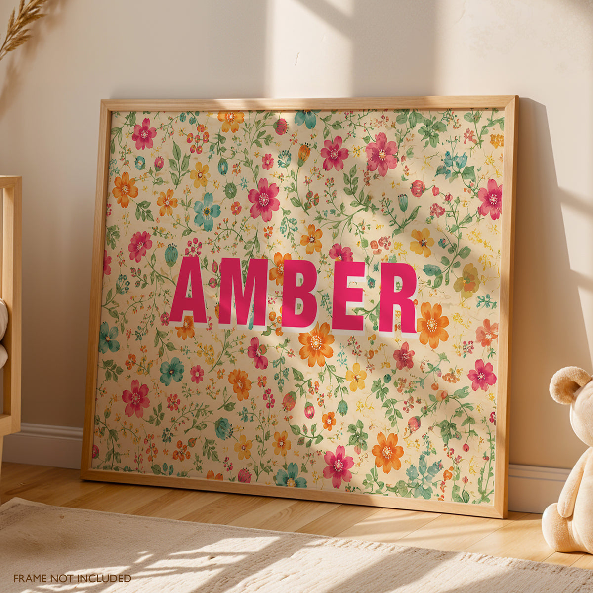 Personalised floral name print with bold pink name and colourful vintage wildflower background
