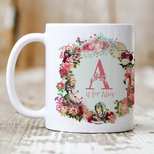 Personalised Alice in Wonderland Mug gift Depicting a montage of a floral arrangement of flowers and a selection of characters from Alice in Wonderland Story with personalised monogram initial in the centre