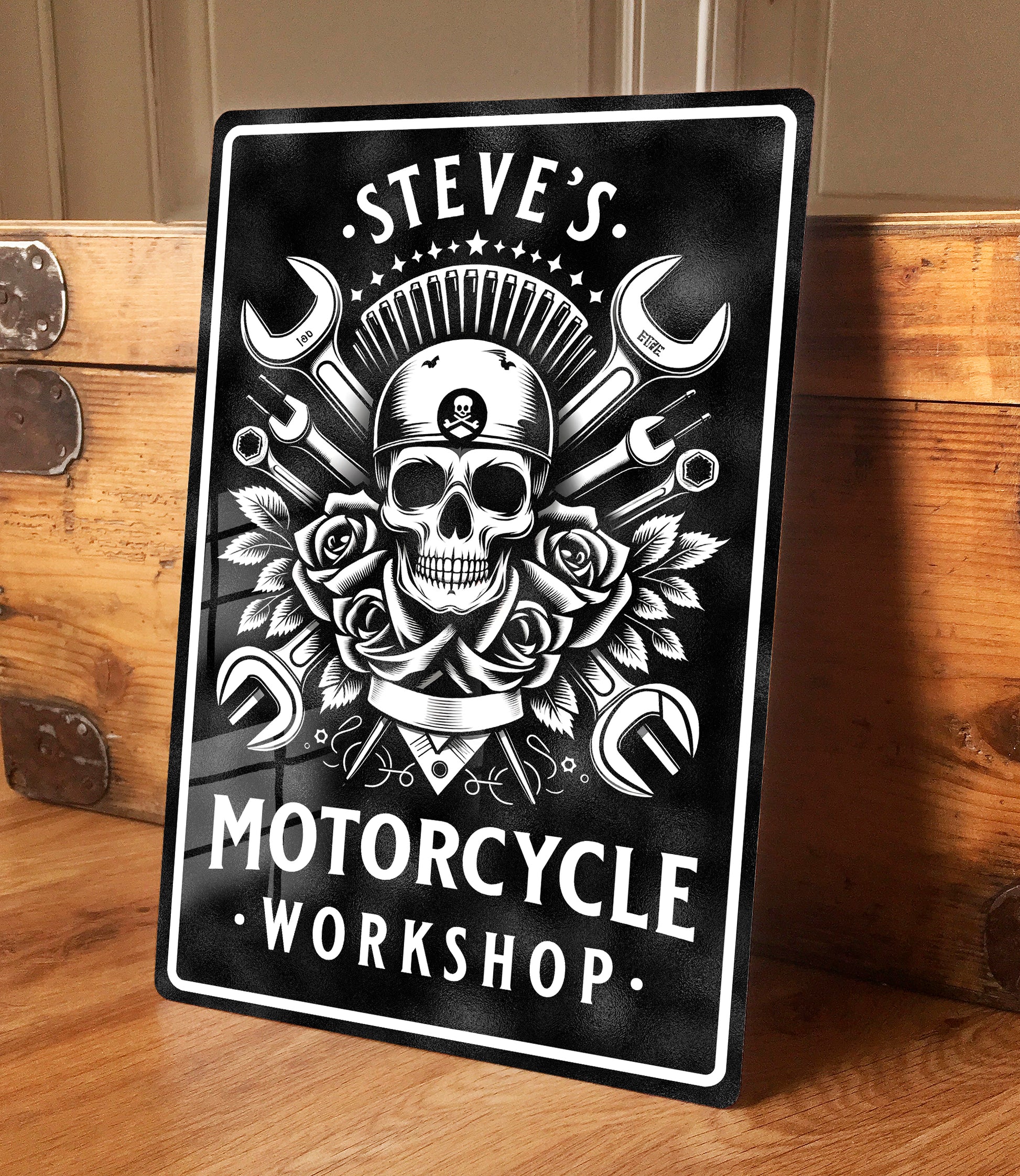 Personalised Motorcycle Workshop Metal Sign depicting skull and crossbones style graphic with mechanics tools