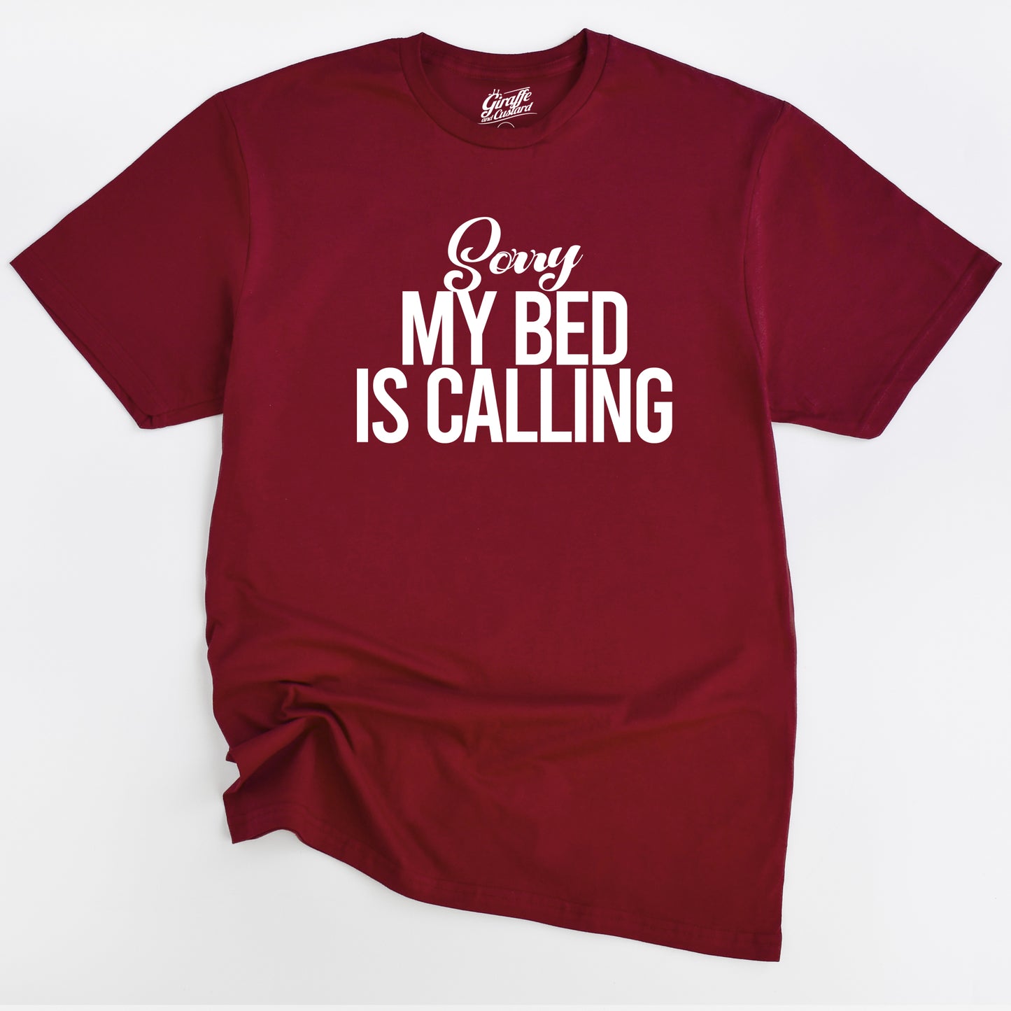 Maroon t-shirt with 'Sorry My Bed Is Calling' text on a white background
