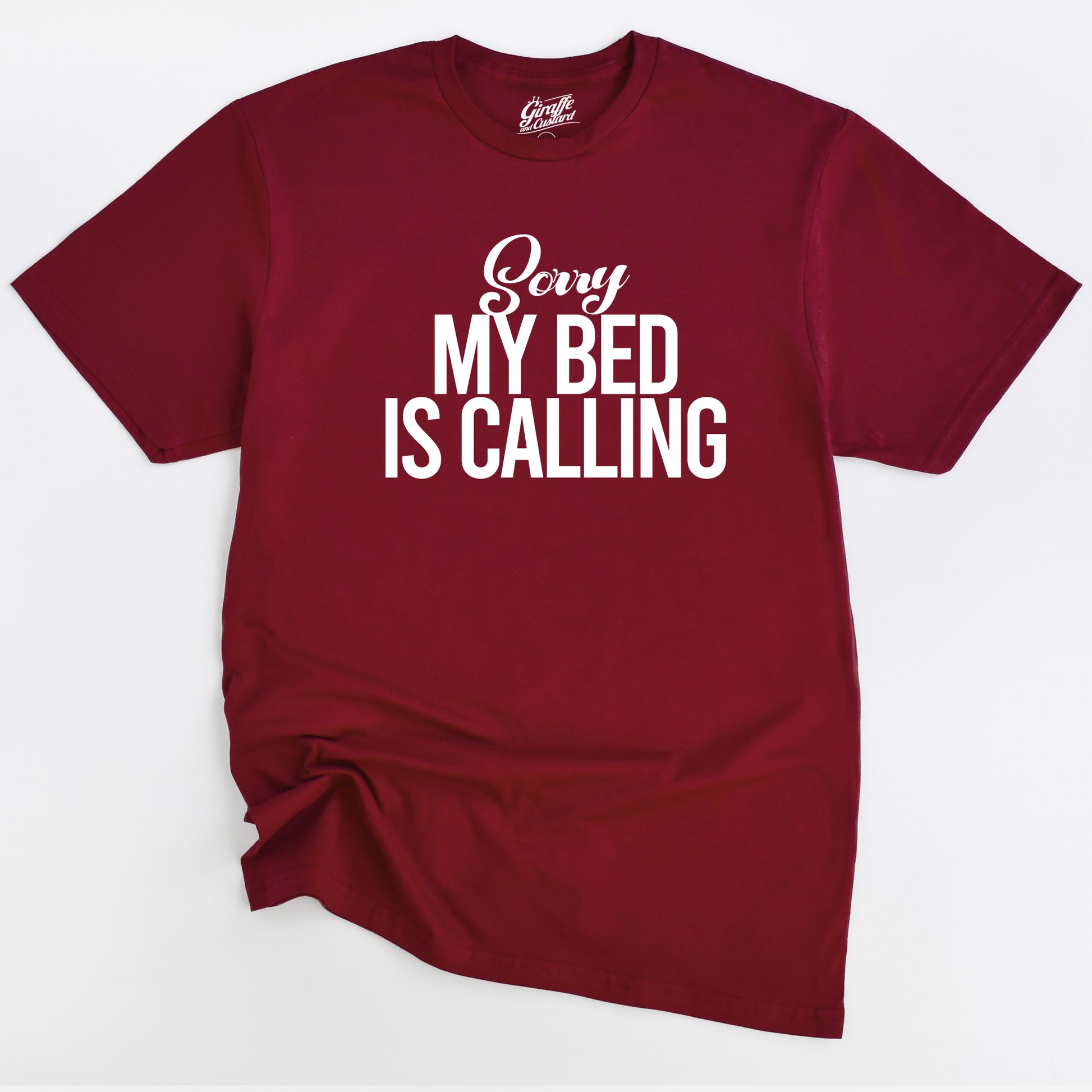 Maroon t-shirt with 'Sorry My Bed Is Calling' text on a white background