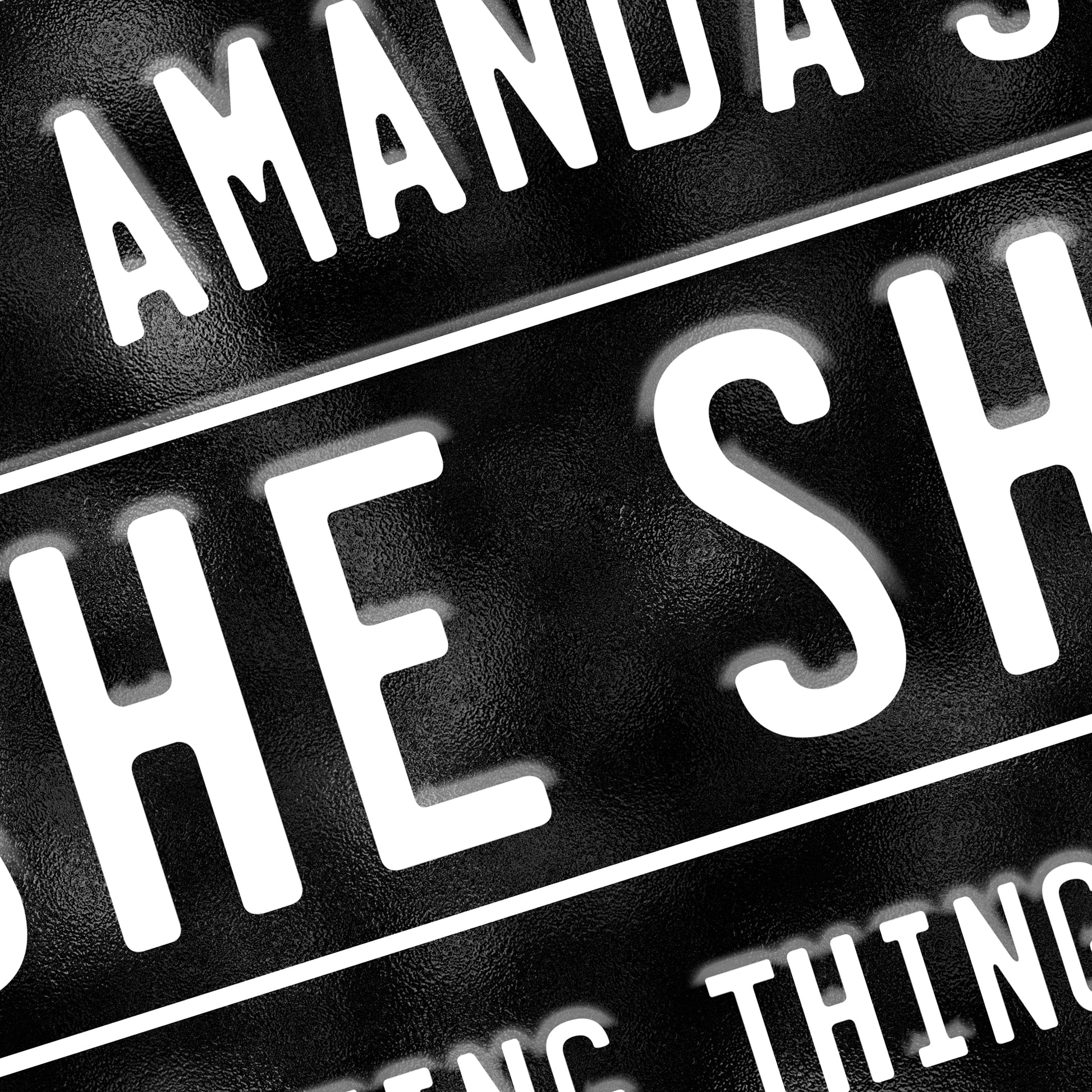 Personalised She Shed Metal Sign in black with white text Close up view 2