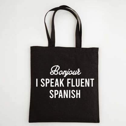 Funny Slogan Tote Bag – “Bonjour, I Speak Fluent Spanish”