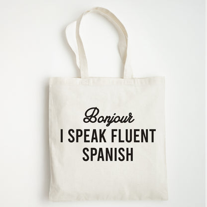 Funny Slogan Tote Bag – “Bonjour, I Speak Fluent Spanish”