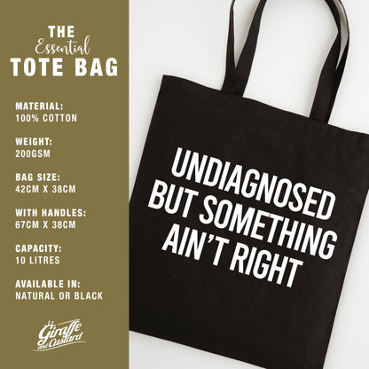Funny Slogan Tote Bag – “Undiagnosed but Something Ain't Right”