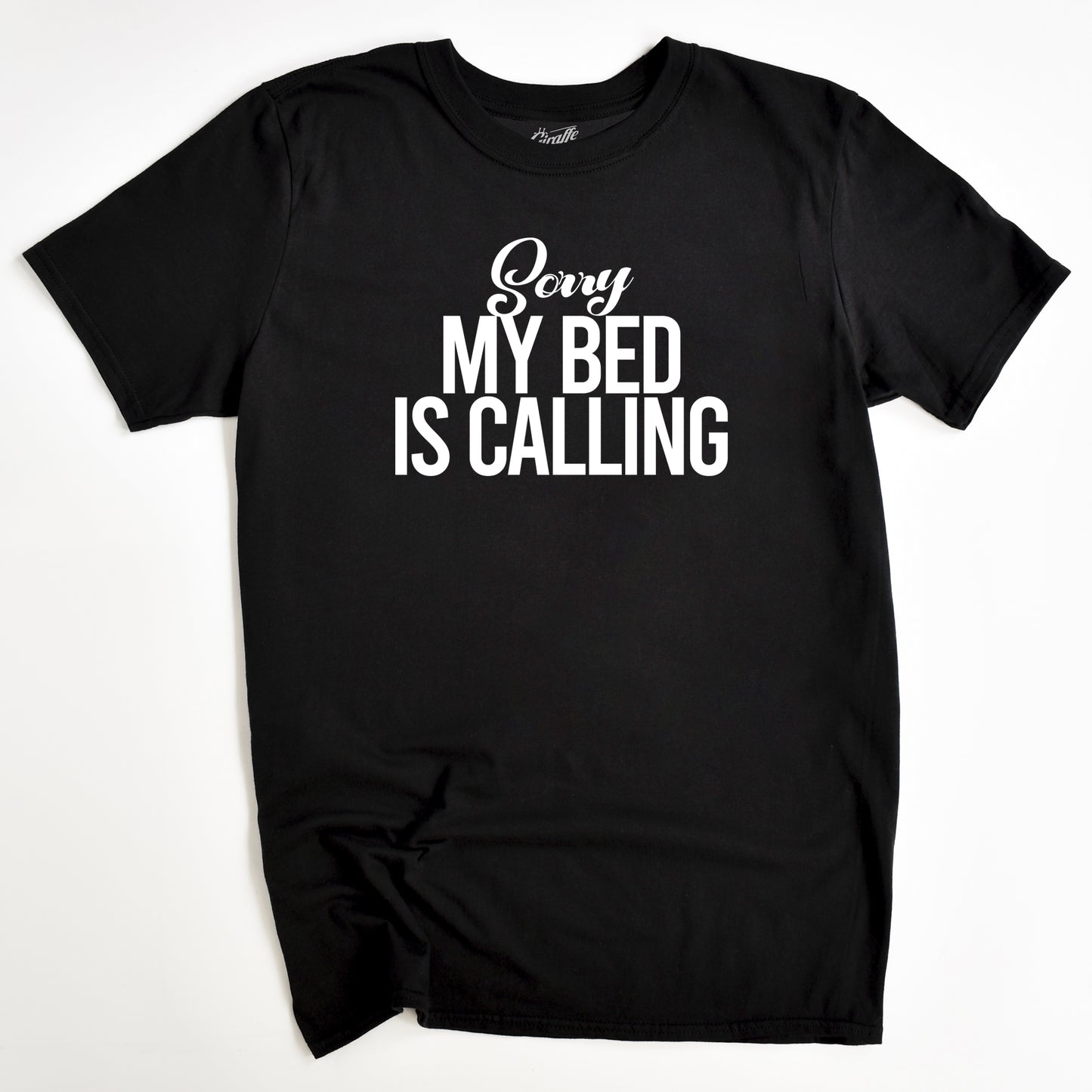 Black t-shirt with white text 'Sorry My Bed Is Calling' on a white background