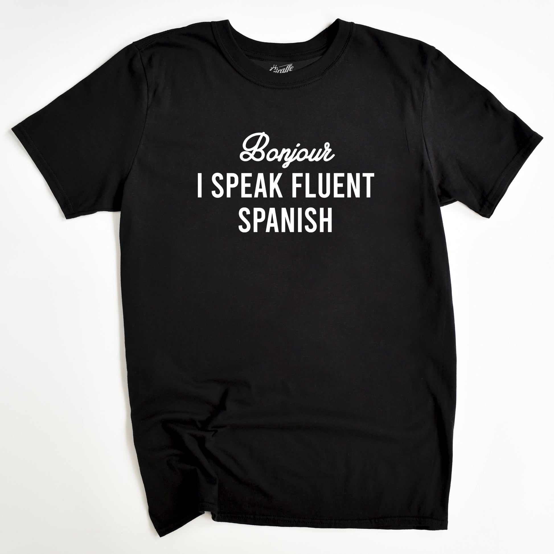 Black T-shirt with the text 'Bonjour I SPEAK FLUENT SPANISH' printed in white.