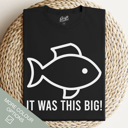 Black t-shirt with a white graphic of a fish and the text 'IT WAS THIS BIG!' on the front.