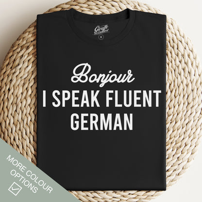 Black crew neck t-shirt with the text 'Bonjour I SPEAK FLUENT GERMAN' printed in white.