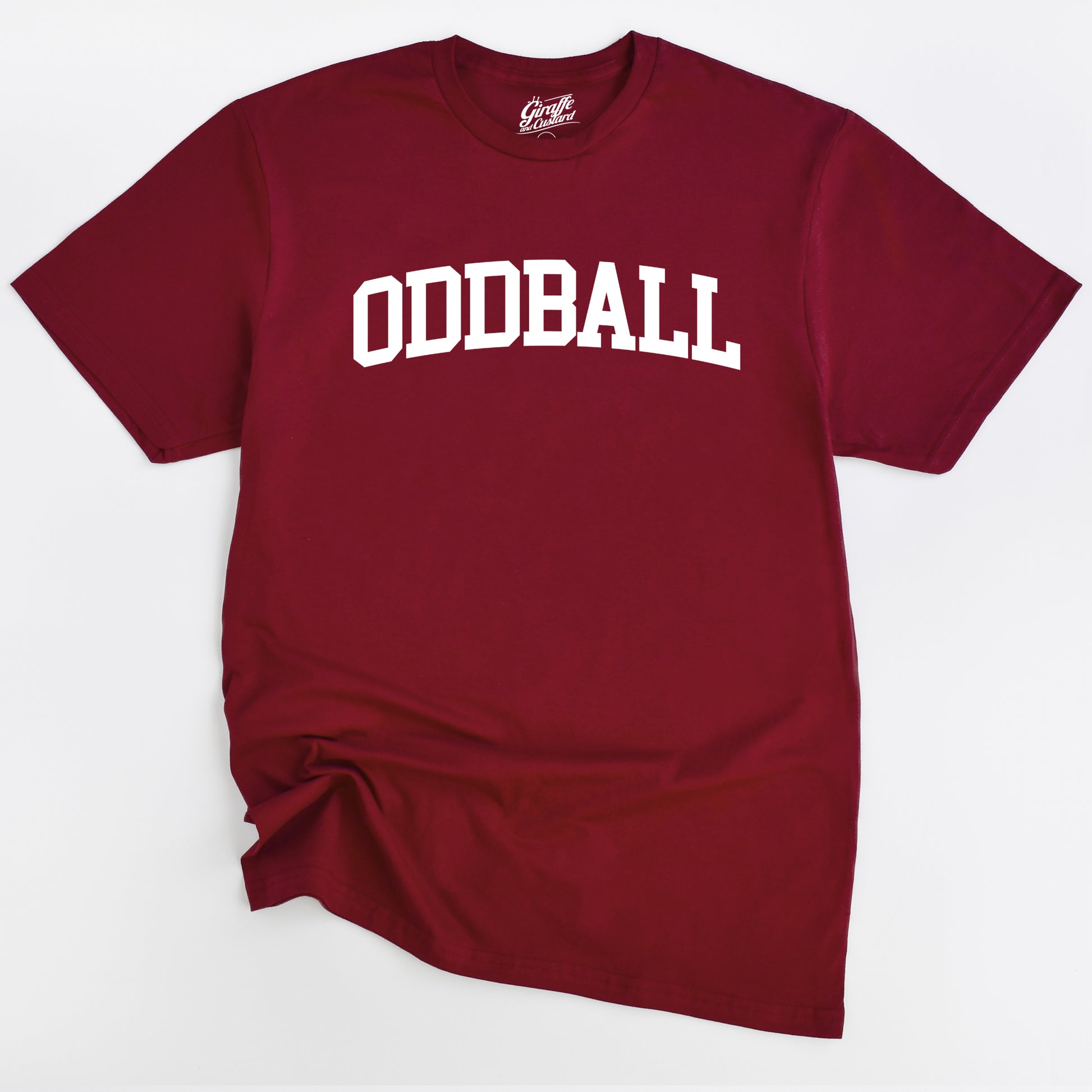 Maroon t-shirt with 'ODDBALL' printed in white on a light gray background