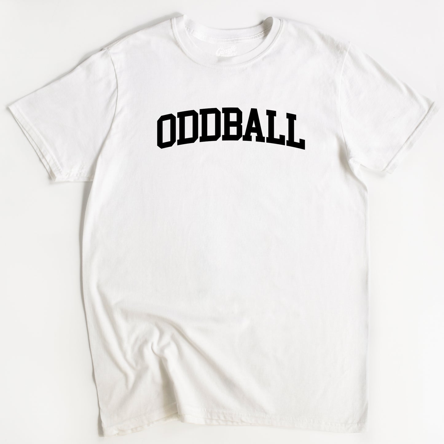 White t-shirt with 'ODDBALL' printed in black on a white background
