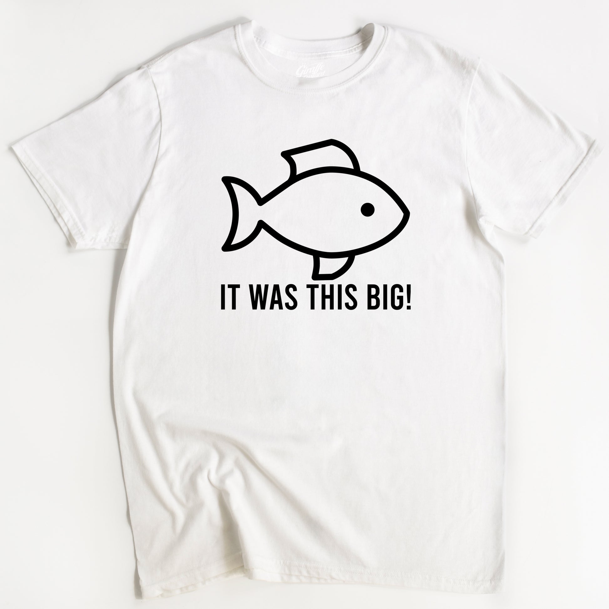 White t-shirt with a white graphic of a fish and the text 'IT WAS THIS BIG!' on the front.