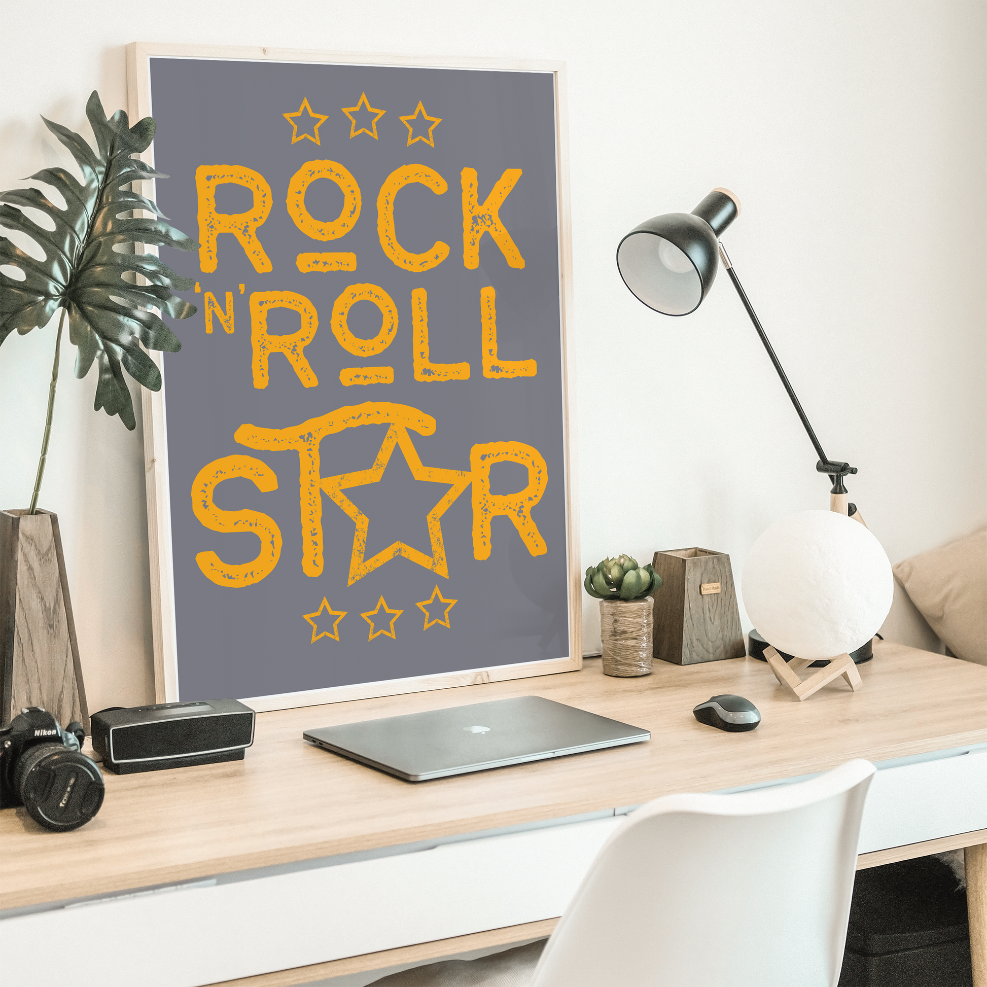 Oasis Wall Art Poster Print Rock and Roll Star framed on desk